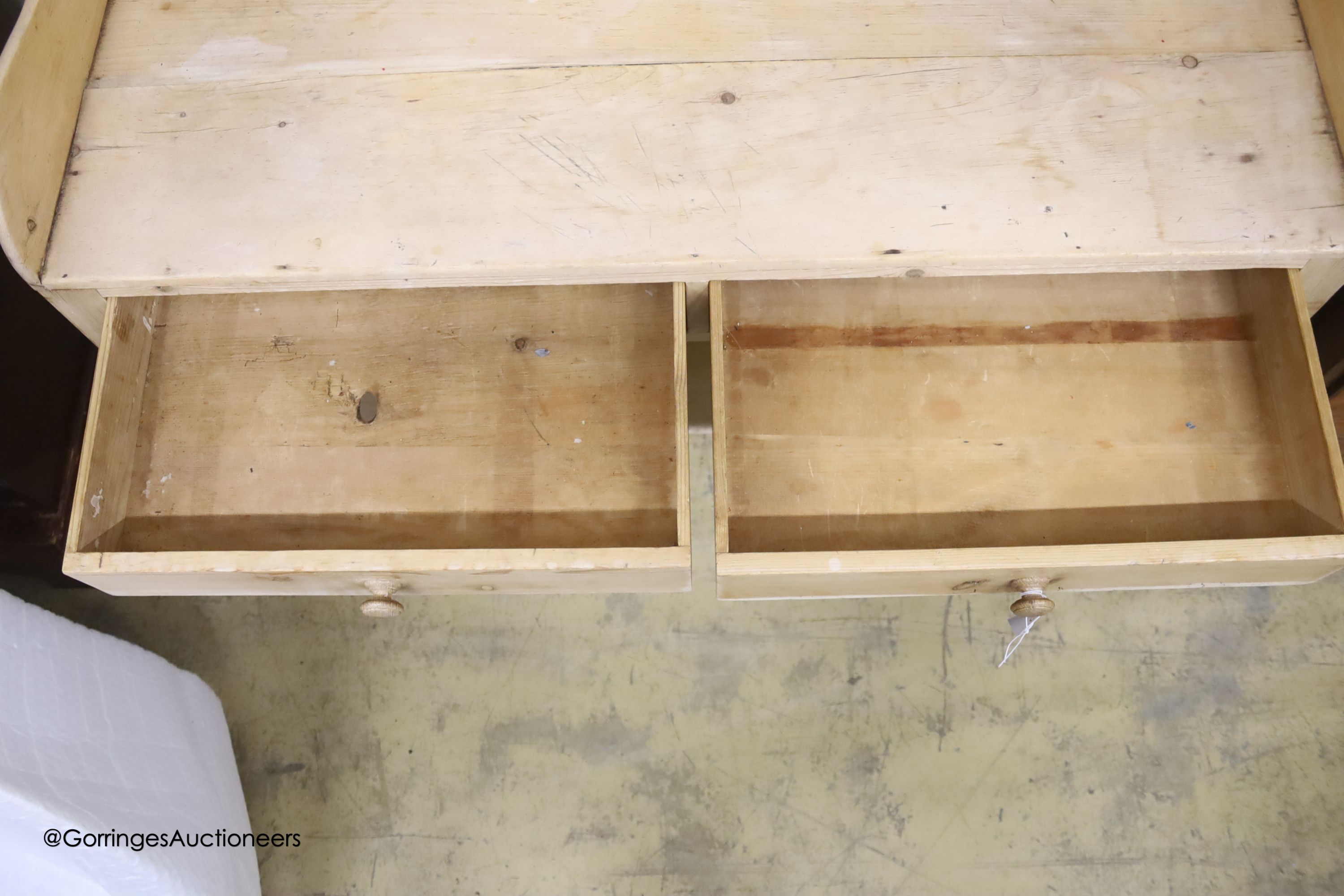 An early 19th century pine two tier washstand, width 105cm, depth 50cm, height 93cm